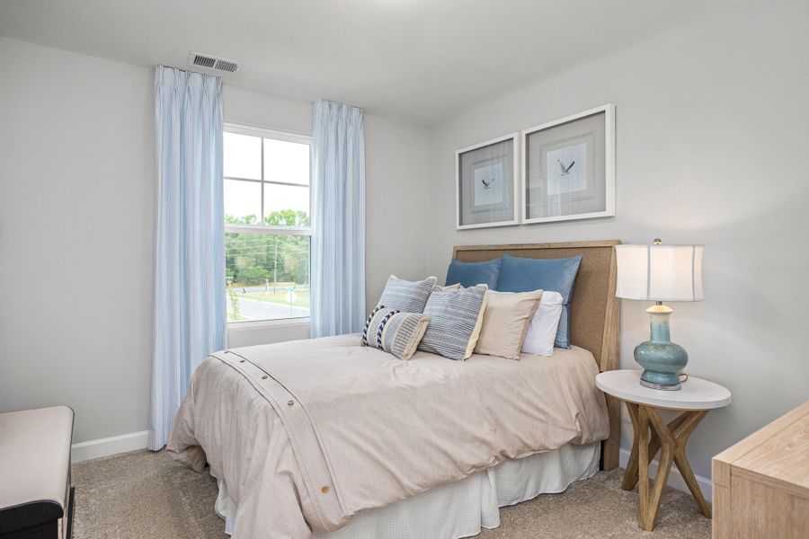 Furnished interior in a model home at Gregory Village Townhomes in Lillington (Image 39).
