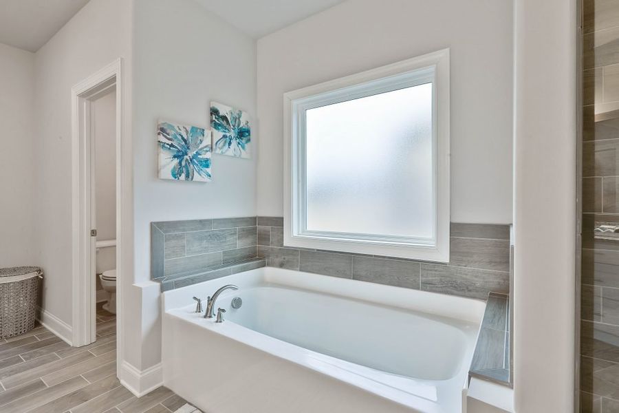 Furnished interior in a model home at Estates at Dorsett Bridge in Douglasville (Image 18).