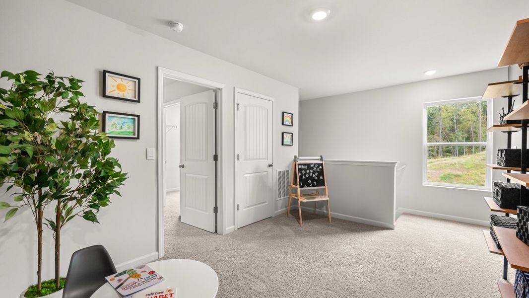 Furnished interior in a model home at Sheffield Highlands in Dallas (Image 30).