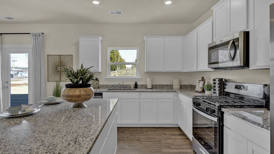 Furnished interior in a model home at Polo Fields in Kingsport (Image 3).