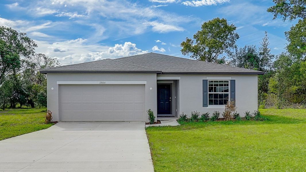 Front exterior of a home in the Poinciana community, located in Poinciana, FL (Image 3). Front exterior of a home in the Poinciana community, located in Poinciana, FL (Image 3).