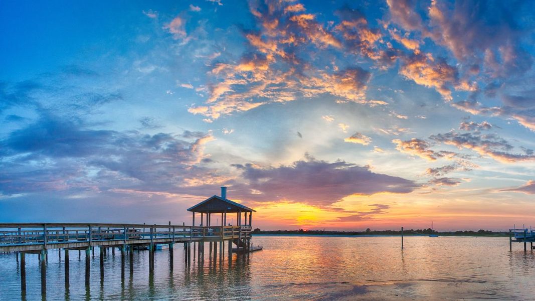 Front exterior of a home in the Songbird community, located in Hampstead, NC (Image 16). Front exterior of a home in the Songbird community, located in Hampstead, NC (Image 16).