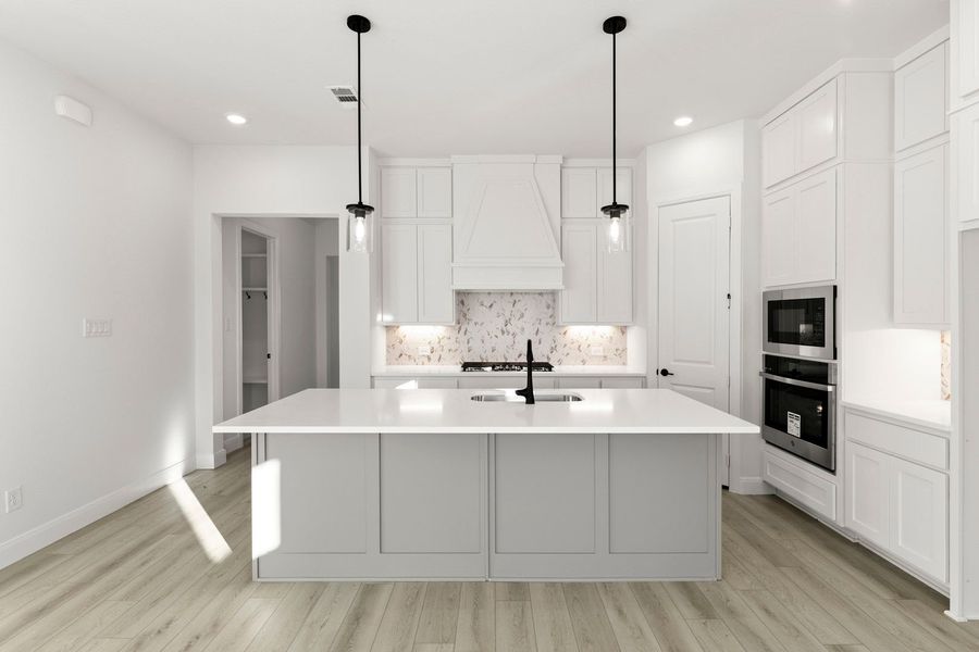 Furnished interior in a model home at West Crossing in Anna (Image 8).