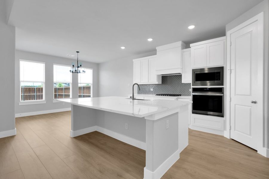 Furnished interior in a model home at Polo Ridge in Forney (Image 32).