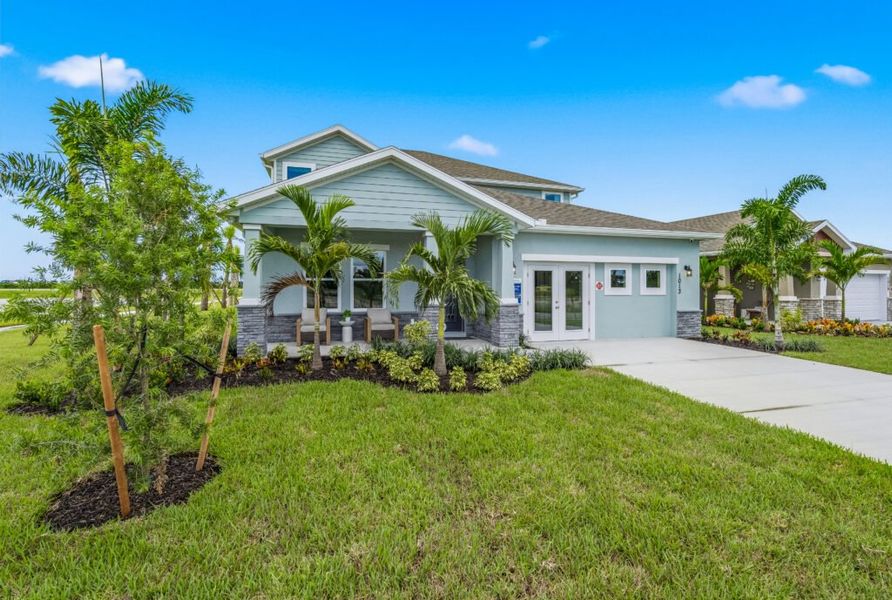 Front exterior of a home in the Pineapple Grove community, located in Fort Pierce, FL (Image 2). Front exterior of a home in the Pineapple Grove community, located in Fort Pierce, FL (Image 2).