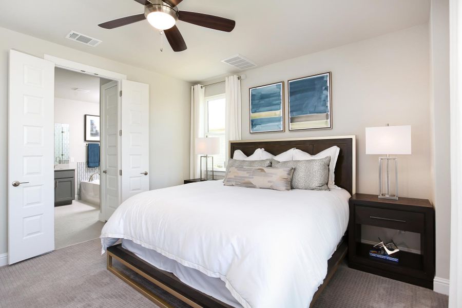 Furnished interior in a model home at Casetta Ranch in Kyle (Image 48).