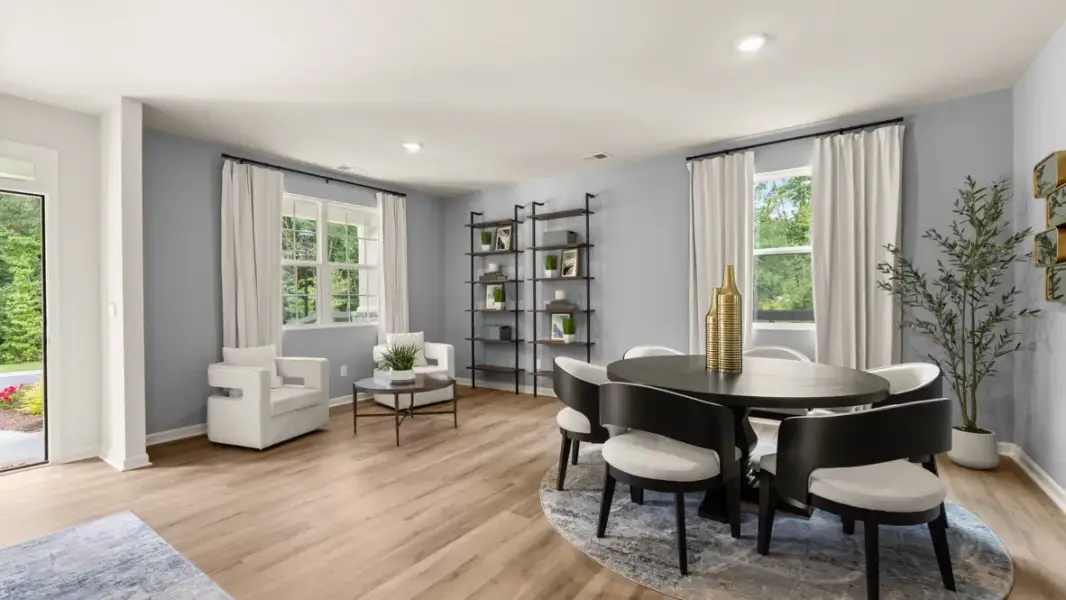 Furnished interior in a model home at Enclave at Stonewall Tell in South Fulton (Image 3).