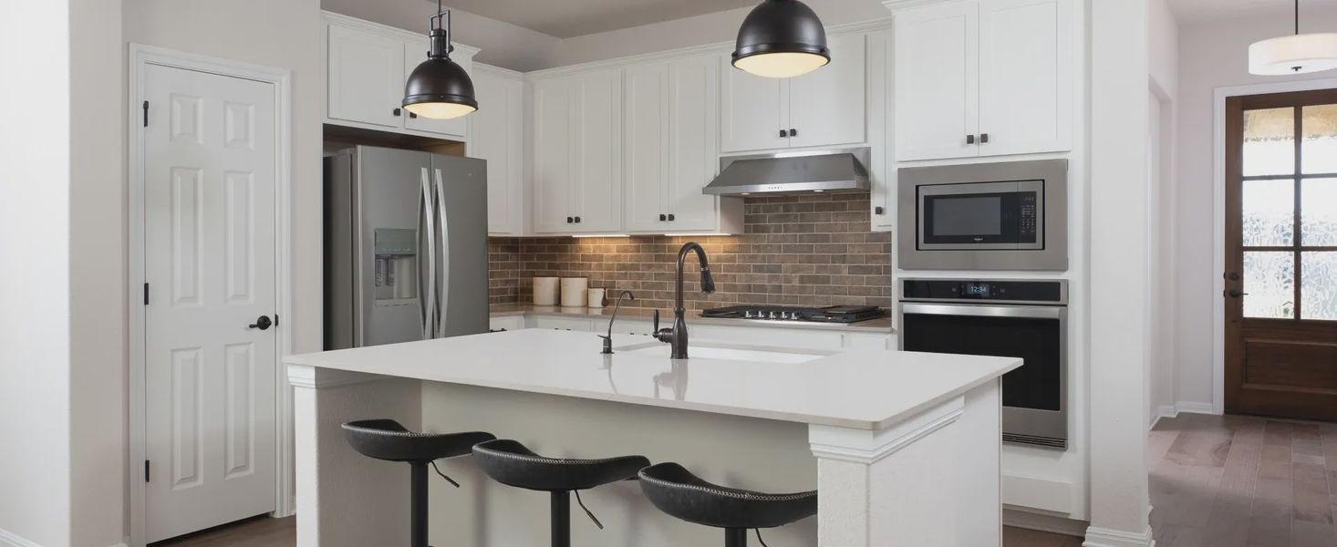 Furnished interior in a model home at Berry Creek Highlands in Georgetown (Image 14).