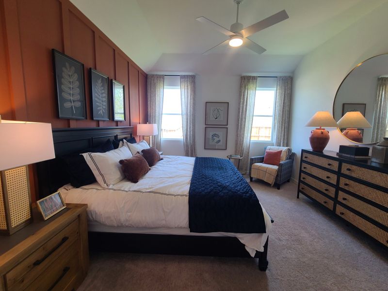 A cozy bedroom with rich accent wall, elegant bedding, modern art, and warm lighting, creating a stylish retreat. A cozy bedroom with rich accent wall, elegant bedding, modern art, and warm lighting, creating a stylish retreat.