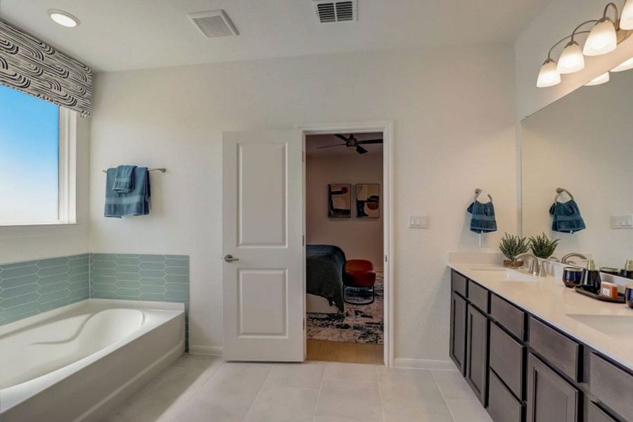 Furnished interior in a model home at Village at Three Oaks in Seguin (Image 3).
