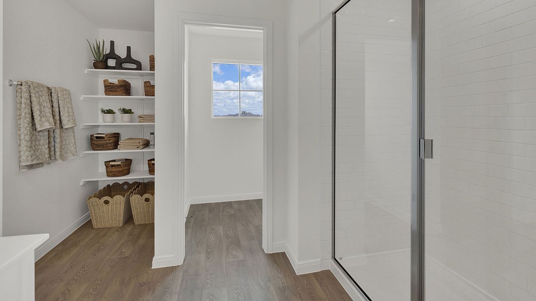 Furnished interior in a model home at Paramount in Kyle (Image 22).