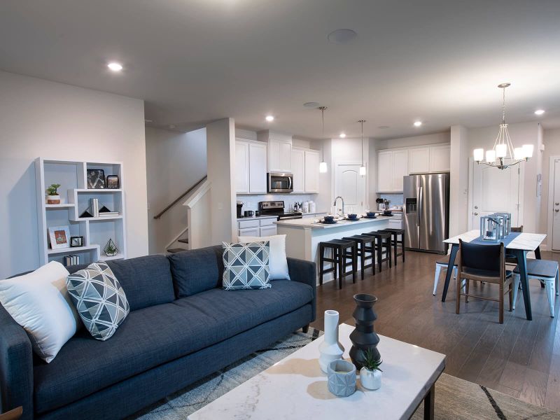 The open-concept layout allows for an easy flow between the kitchen, dining, and living areas.