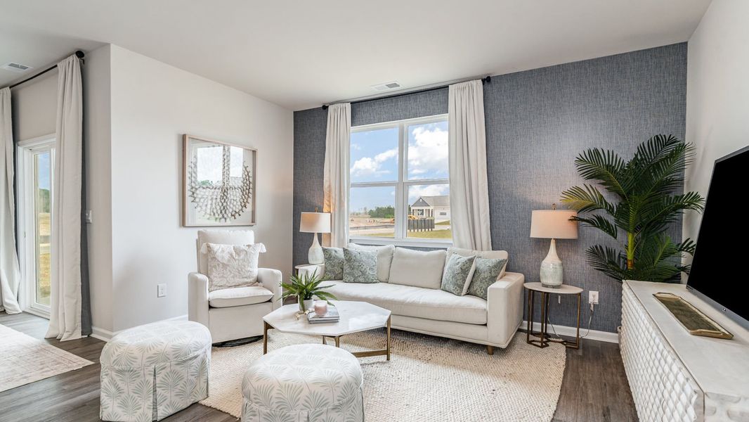 Furnished interior in a model home at Sutton Farm in Loris (Image 6).