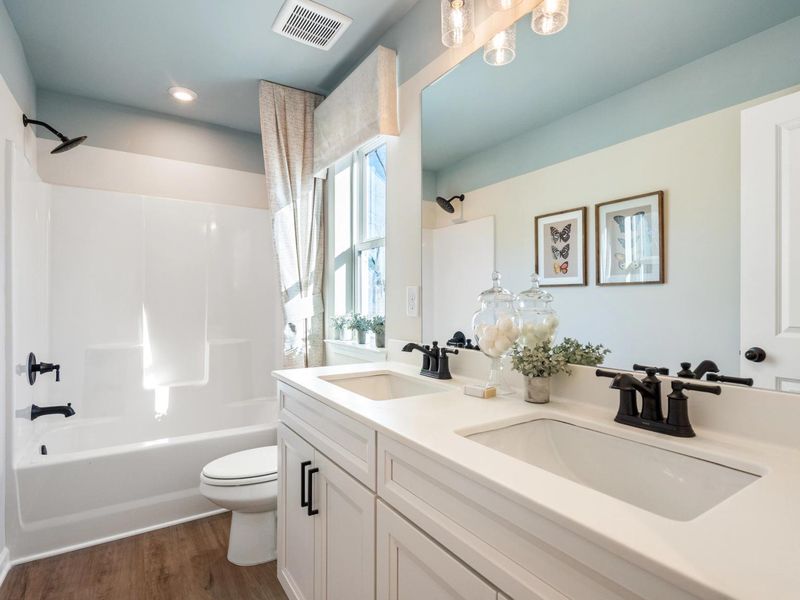 Furnished interior in a model home at The Village at Shallowford in Kennesaw (Image 18).