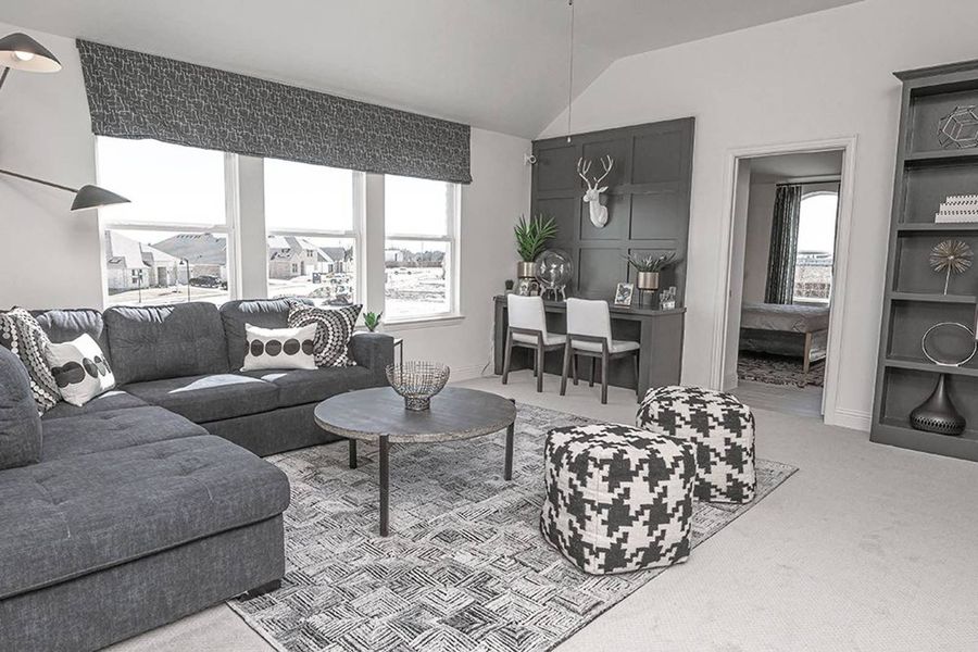 Furnished interior in a model home at Oaks of North Grove in Waxahachie (Image 8).