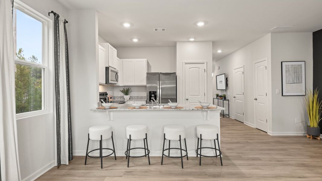 Furnished interior in a model home at Woodbury Park in Atlanta (Image 10).
