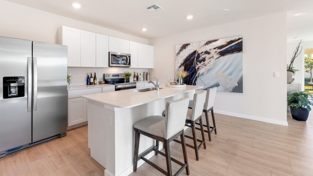 Furnished interior in a model home at Cove at West Port - Express in Port Charlotte (Image 37).