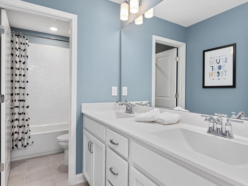 Furnished interior in a model home at Woodland Crossing in Zebulon (Image 14). Furnished interior in a model home at Woodland Crossing in Zebulon (Image 14).