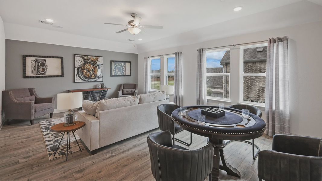Furnished interior in a model home at Sundance Cove in Crosby (Image 3).