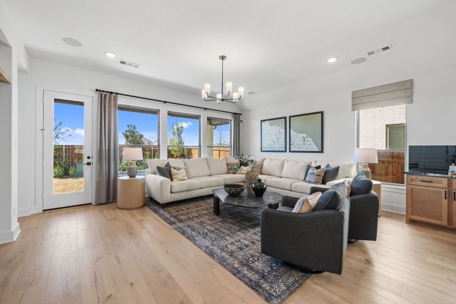 Furnished interior in a model home at Chaparral Park in Oak Point (Image 20).