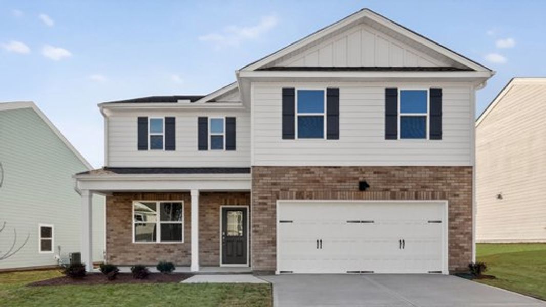 Front exterior of a home in the Bexford community, located in Willow Spring, NC (Image 4).
