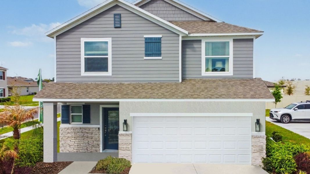 Front exterior of a home in the Canterwood Acres community, located in Ocala, FL (Image 12).