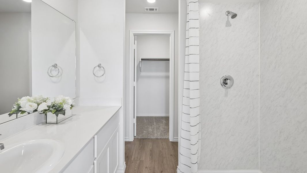 Furnished interior in a model home at Stonewood in Sulphur Springs (Image 30).