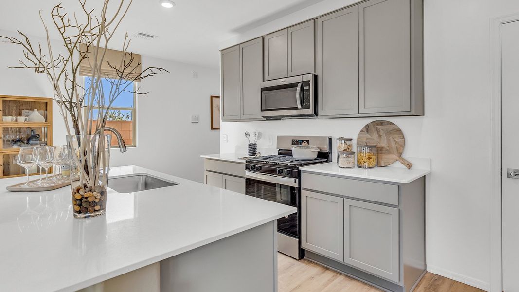 Furnished interior in a model home at Coronet at Gladden Farms in Marana (Image 47).