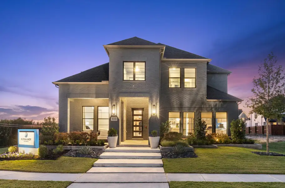 Front exterior of a home in the Windsong Ranch community, located in Prosper, TX (Image 5).