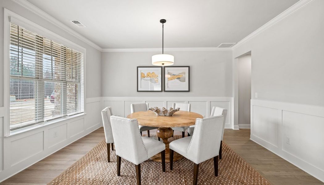Furnished interior in a model home at Traditions of Braselton in Jefferson (Image 27).