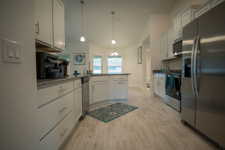 Furnished interior in a model home at North Port in North Port (Image 6).