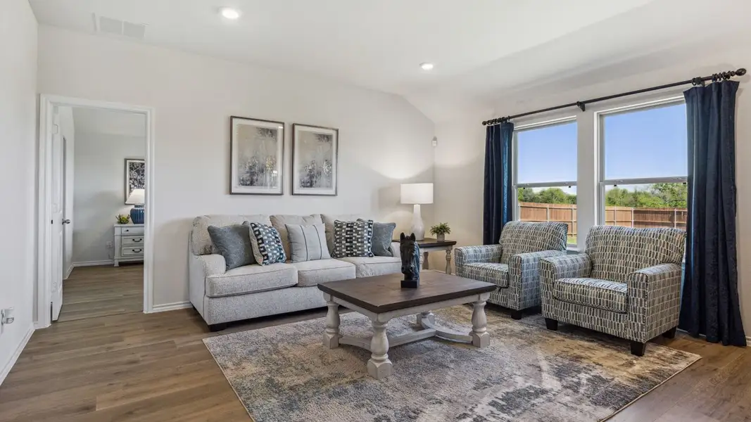 Furnished interior in a model home at Creeks at Burnett Trail in Canton (Image 9).