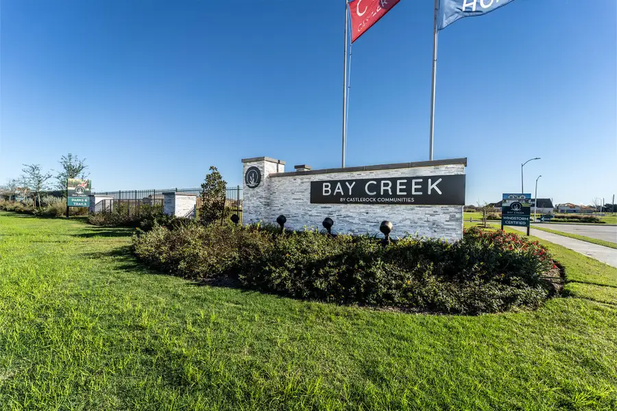 Entrance to the Bay Creek community in Baytown, TX, featuring signage and landscaping (Image 13).