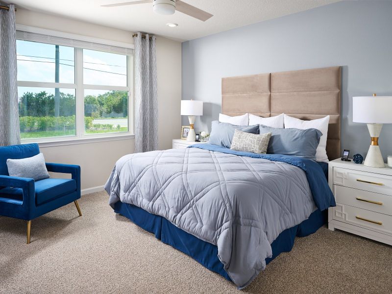 The primary bedroom of the Foxglove at Hampton Park