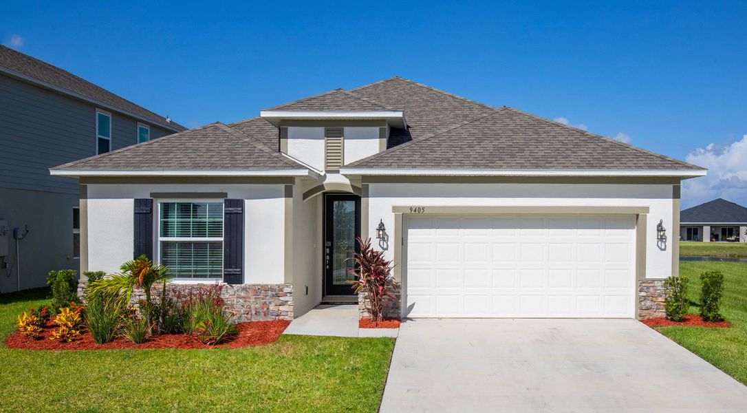 Front exterior of a home in the Avalon Woods community, located in Newberry, FL (Image 2). Front exterior of a home in the Avalon Woods community, located in Newberry, FL (Image 2).