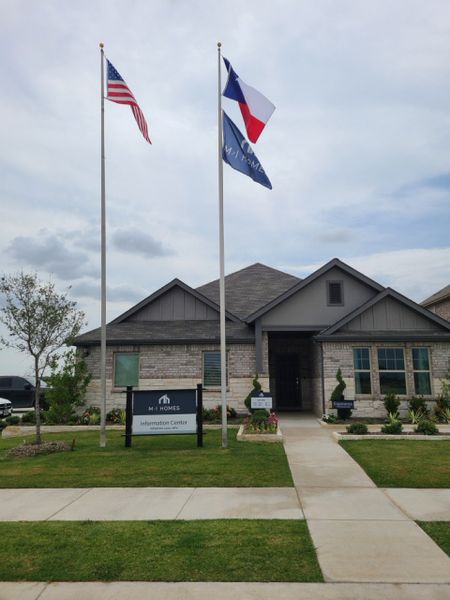 A charming brick home with manicured landscaping at Meadow Park by M/I Homes in Denton, TX. A charming brick home with manicured landscaping at Meadow Park by M/I Homes in Denton, TX.