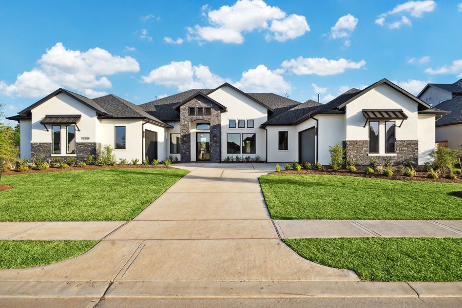 Front exterior of a home in the Sienna community, located in Missouri City, TX (Image 3).
