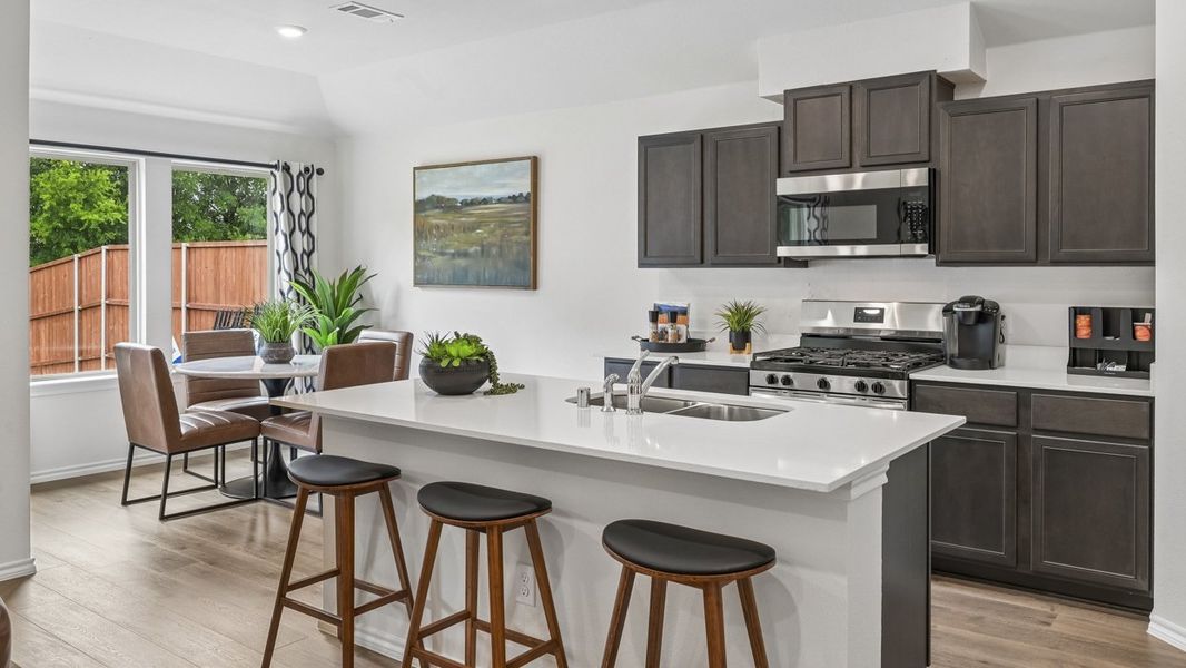 Furnished interior in a model home at Three Oaks in Sherman (Image 5).