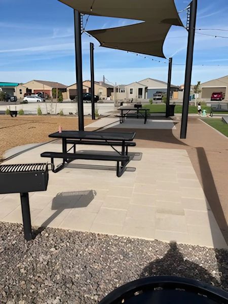 A scenic community area with picnic tables and grills in Bella Vista Trails Reserve Series by Meritage Homes (San Tan Valley, AZ). A scenic community area with picnic tables and grills in Bella Vista Trails Reserve Series by Meritage Homes (San Tan Valley, AZ).