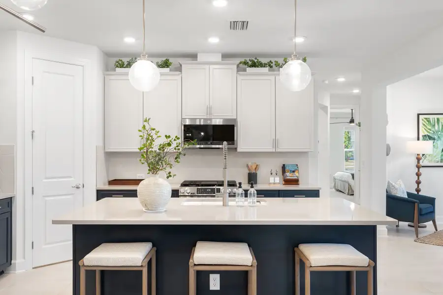 Furnished interior in a model home at Westerly Park at Wildlight – Villa Collection in Yulee (Image 6). Furnished interior in a model home at Westerly Park at Wildlight – Villa Collection in Yulee (Image 6).