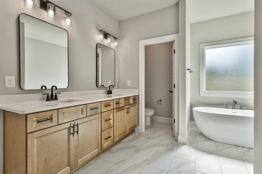 Furnished interior in a model home at Leverett Park in Newnan (Image 4).