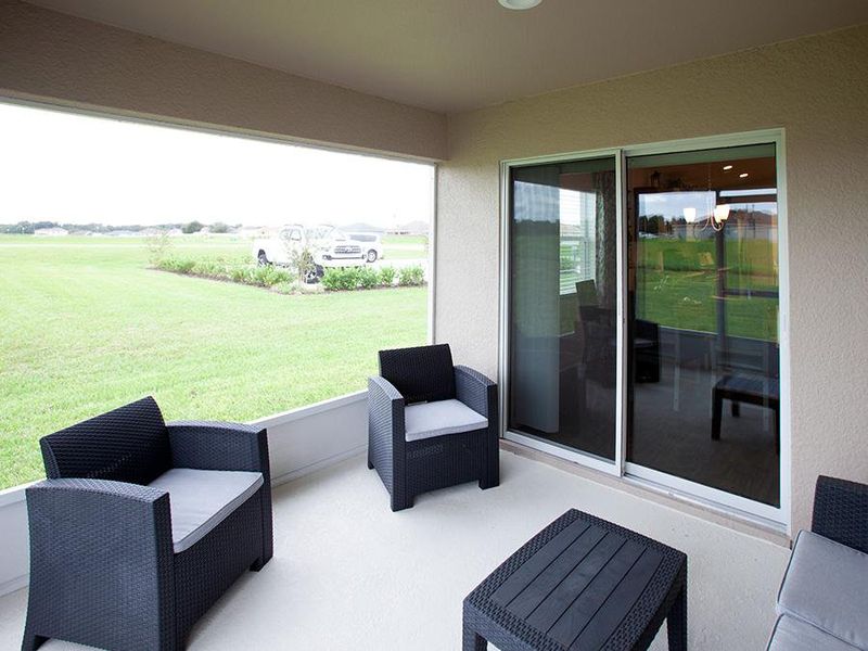 Your living space extends outdoors onto your covered lanai - Parker model home in Ocala, FL