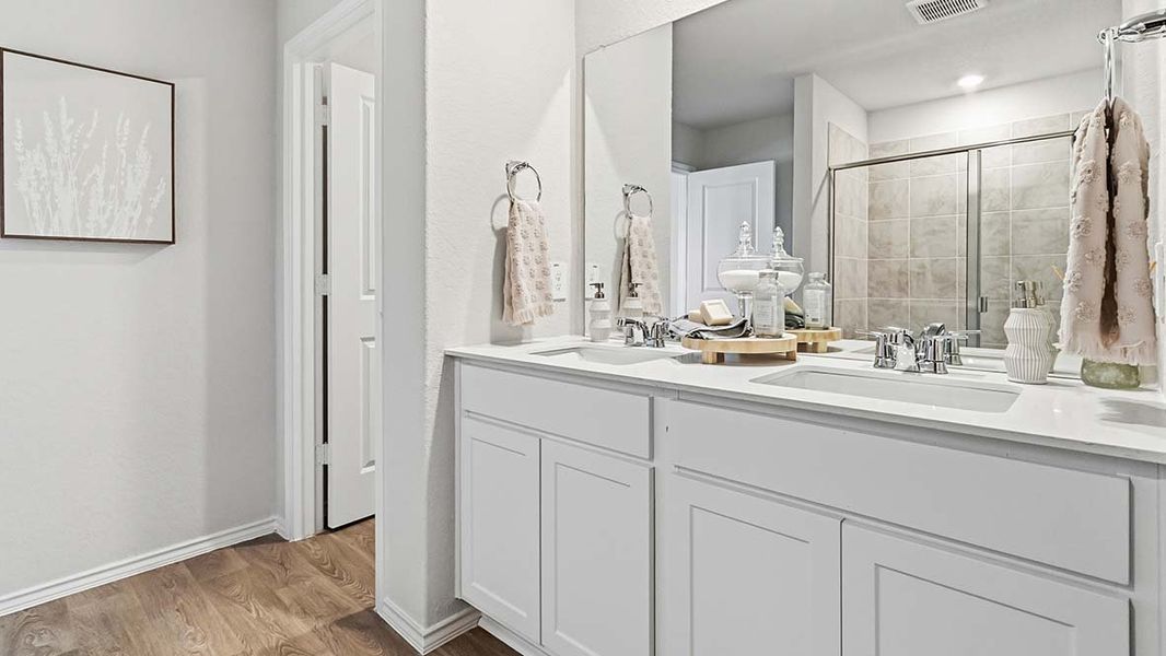 Furnished interior in a model home at Blue Ridge Ranch in San Antonio (Image 36).
