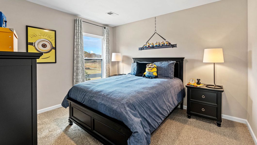 Furnished interior in a model home at Lightwood Cottages in Moore (Image 9).