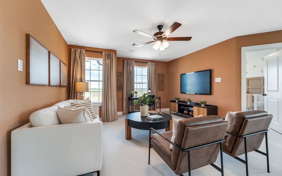 Furnished interior in a model home at Harvest Pointe in Needville (Image 22).