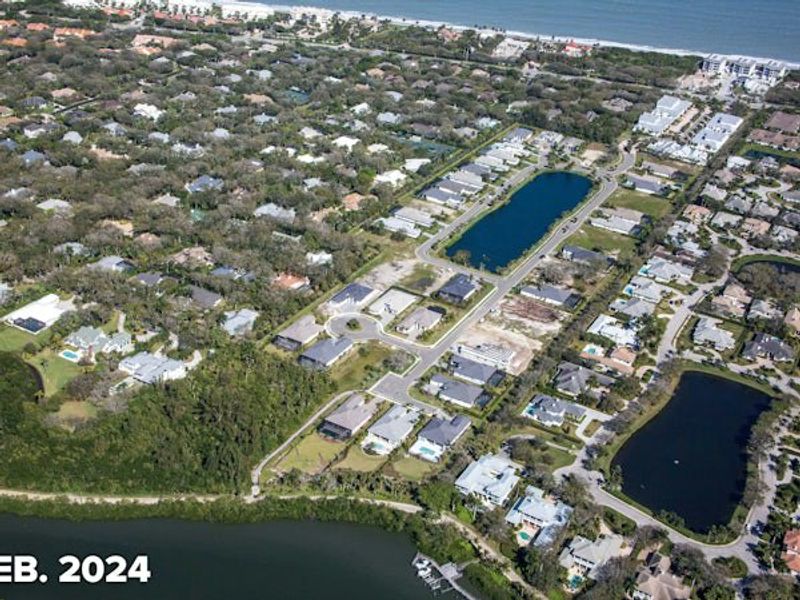 Aerial view of the The Strand community in Vero Beach, FL, showing layout and nearby surroundings (Image 13).