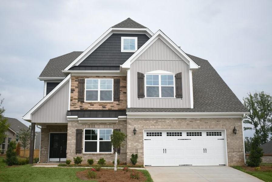Front exterior of a home in the Weybridge community, located in Burlington, NC (Image 32).