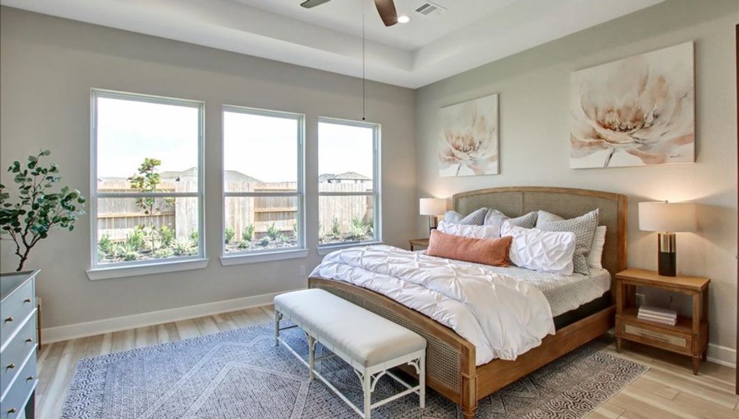 Furnished interior in a model home at Sunterra 40 in Katy (Image 32).