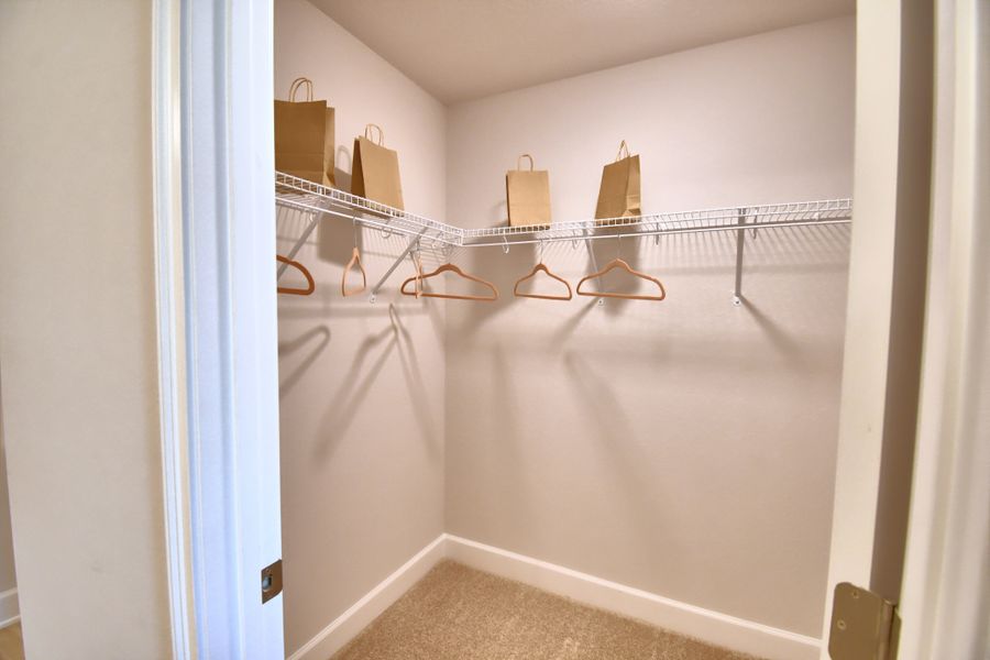 Furnished interior in a model home at Citrus Landing in Davenport (Image 29).