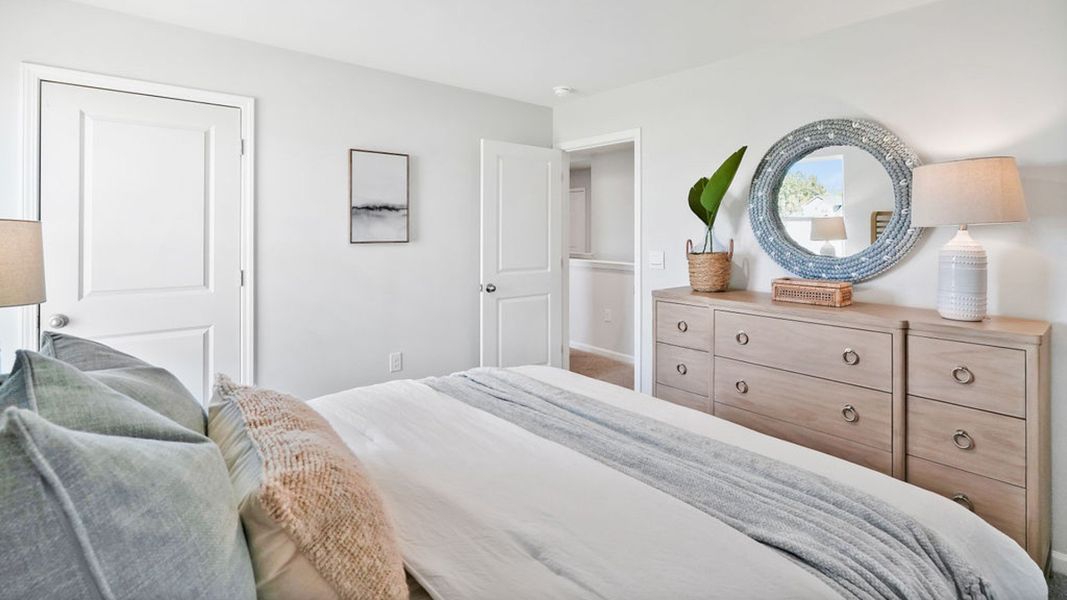 Furnished interior in a model home at Bella Point in Bolivia (Image 27).